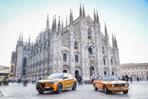 alfa romeo stelvio gt junior in front of milano duomo